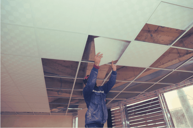 Installation of ceiling tiles on a suspended ceiling