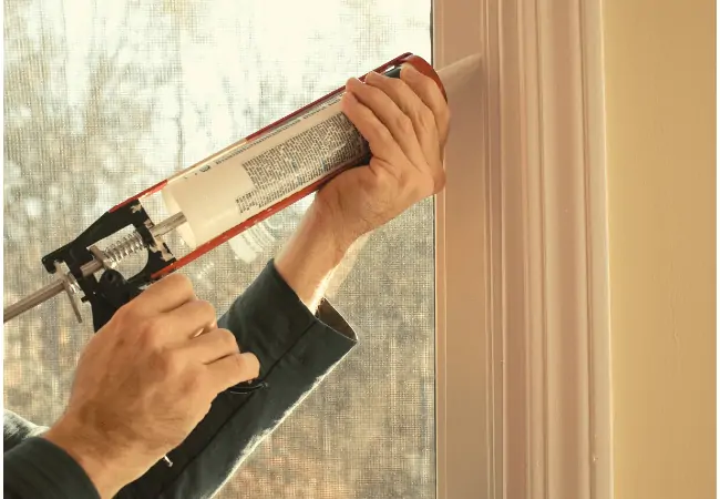 Acoustic caulk to seal window gaps