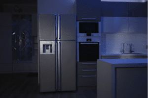 Quiet refrigerator in a kitchen at night