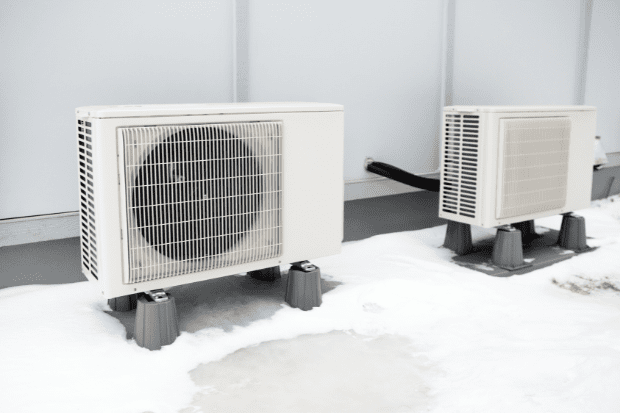 Image showing an outdoor Ac unit where warm air is expelled.