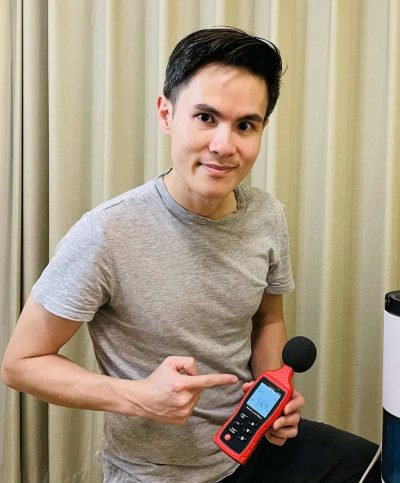 Ludovic holding a noisemeter